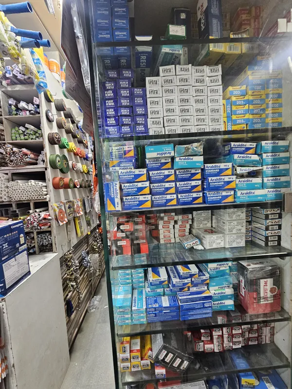 Glass cabinet of adhesives and sealants including Araldite, Fevikwik, M-Seal and Astral Resibond at Mahalaxmi Hardware and Electricals