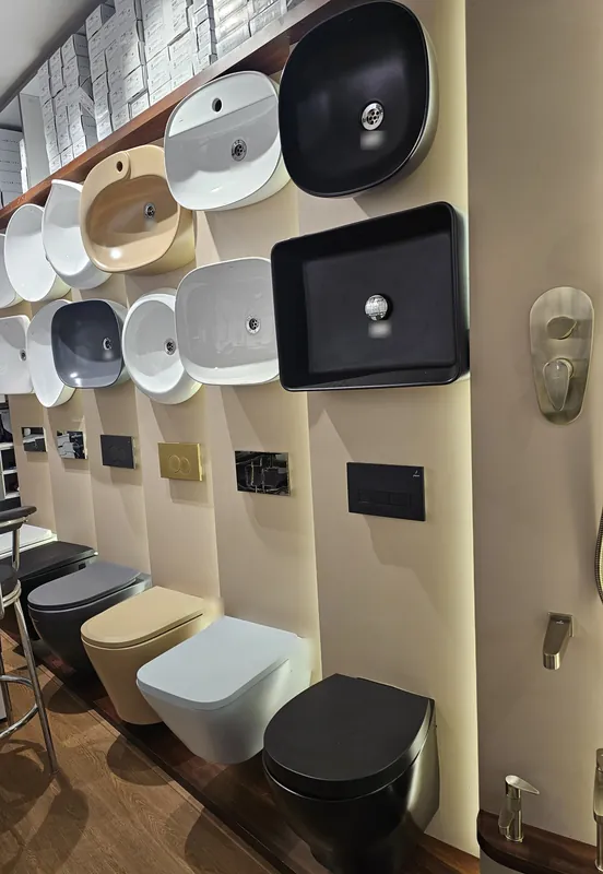 Basins, wall-hung WCs and flush plates on display at Mahalaxmi Ceramics, Kothrud, Pune